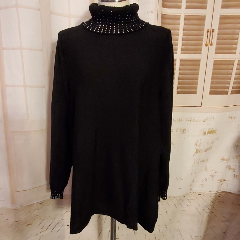 Turtleneck sweater with crystals. Final markdown